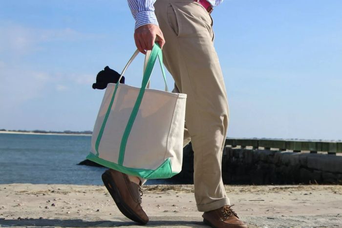 A person carrying the L.L.Bean Boat and Tote Bag