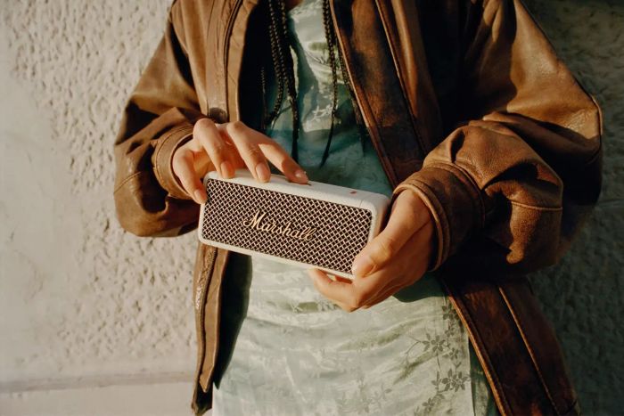 A person holding the Marshall Emberton II Bluetooth Speaker