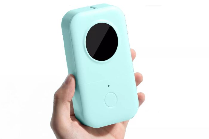 A person holding the Phomemo D30 Label Maker Machine