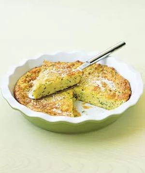 This savory zucchini pie is enhanced with provolone and Parmesan cheeses.