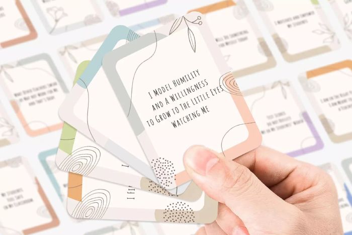 A person holding the Cheroloven Teacher Affirmation Cards