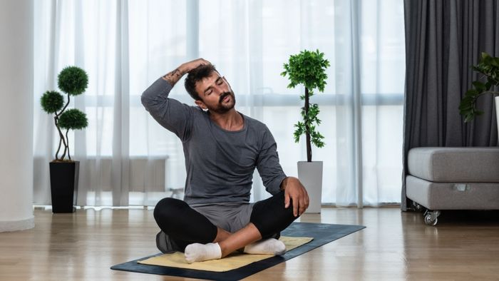 man practicing yoga