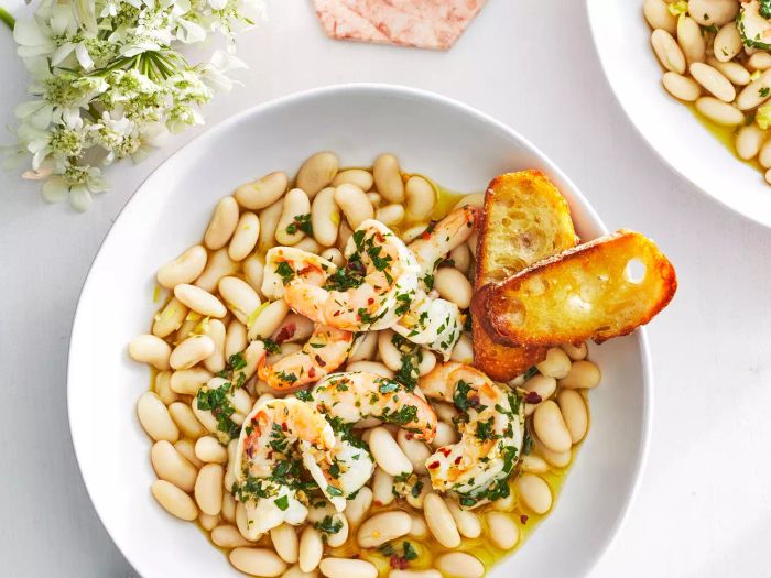 Shrimp in a rich, buttery sauce paired with marinated white beans.