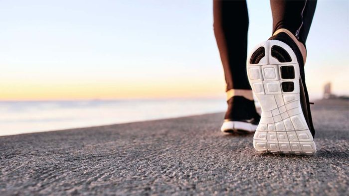 Imagine your feet in running shoes, the sand beneath them, and the sound of the ocean—something like that.