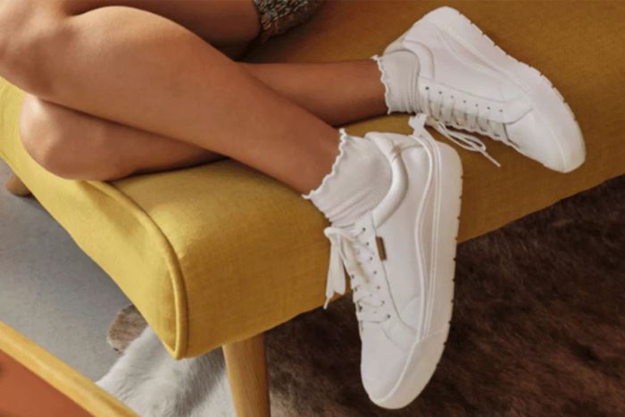 A person wearing Dr. Scholl's Time Off Lace Up.