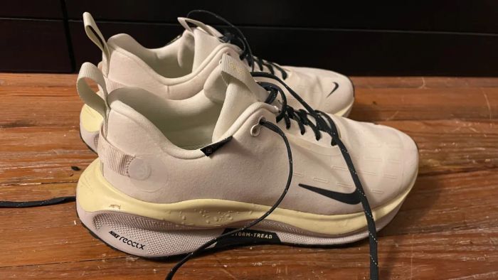 Nike waterproof shoes, still holding onto droplets after a run.