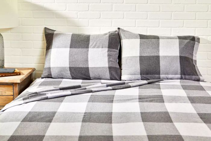 A bed dressed with the Brooklinen Flannel Core Sheet Set