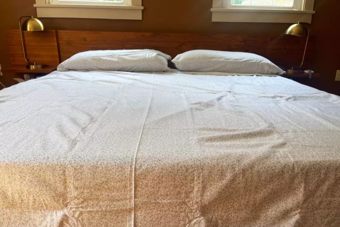 A bed dressed with the Laura Ashley Home Collection Premium Ultra Soft Cotton Flannel Sheets