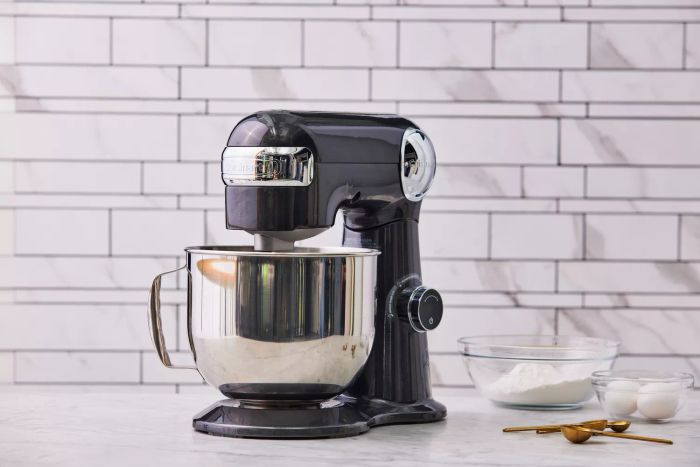 The Cuisinart 5.5-Quart Stand Mixer placed on a polished marble countertop
