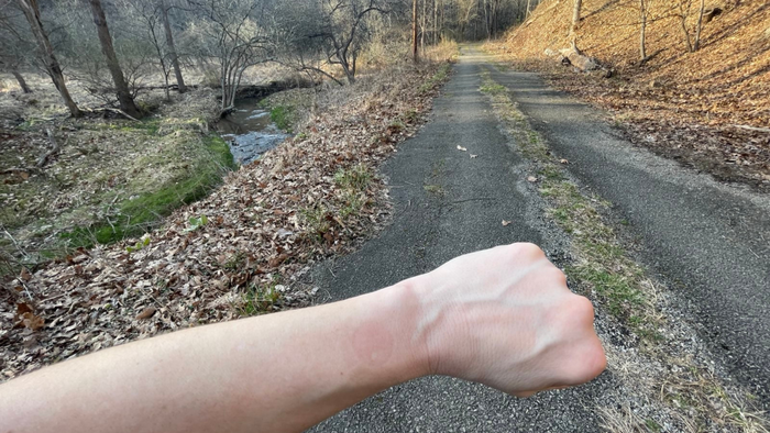 bare wrist on a running trail