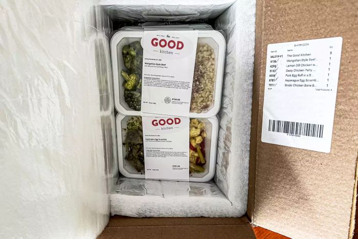 A selection of The Good Kitchen meals packed in an insulated box