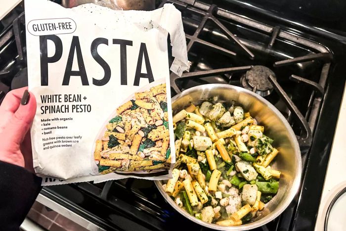 Someone preparing a pasta bowl from the Daily Harvest Meal Kit