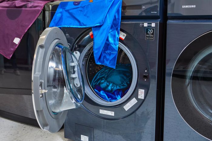 Decolure Satin Sheet Set in washing machine during testing