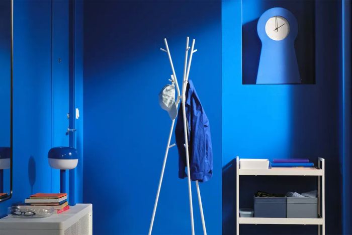 a room adorned with vivid blue walls and matching decorative elements