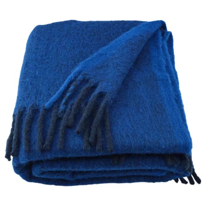 a cozy blue throw blanket