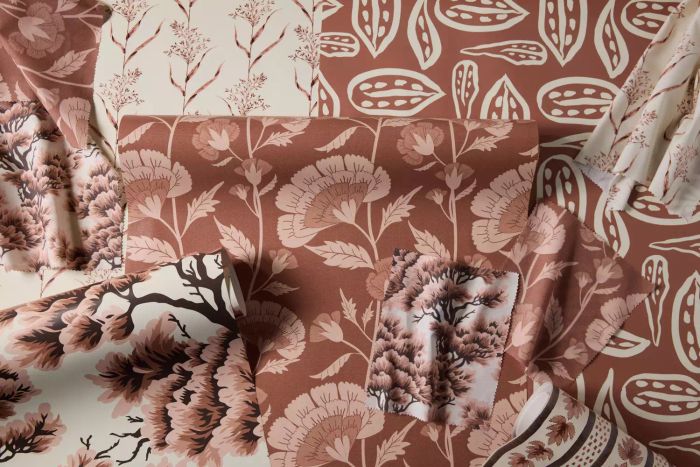 floral wallpaper samples featuring brown and pink tones