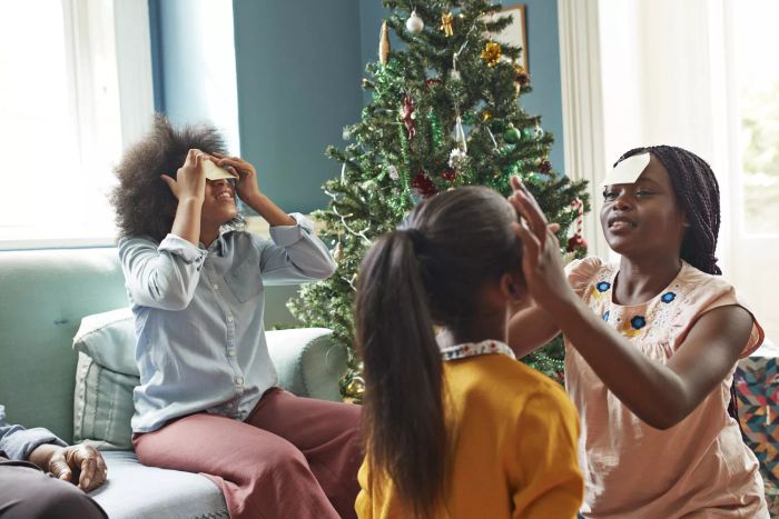 Christmas Games: A family enjoying a holiday game together