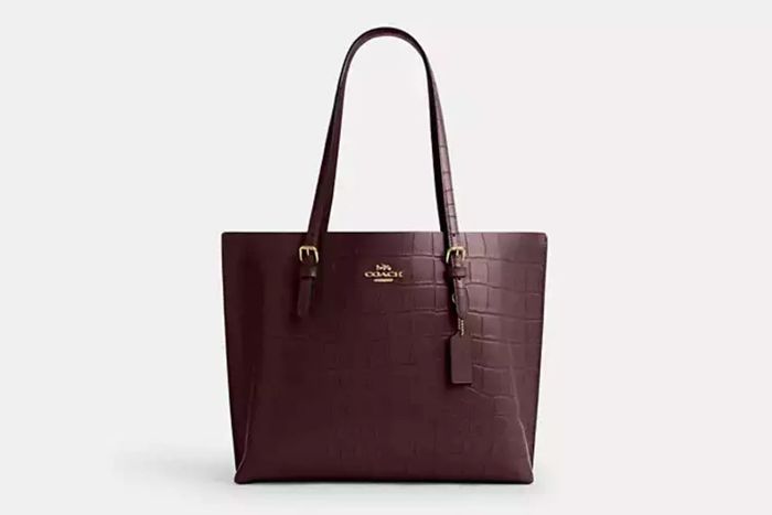 The Mollie Tote Bag is the perfect blend of elegance and practicality for any occasion.