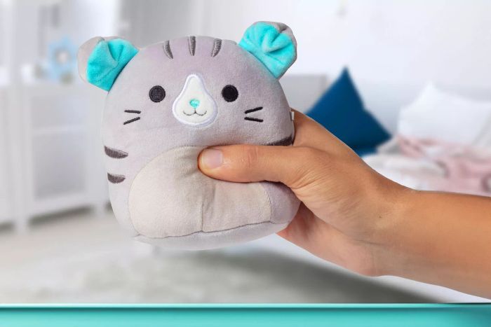 A person is holding one of the super-soft toys from the Squishmallows Original Mystery Box