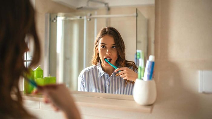 Stop rinsing your mouth after brushing – here's why