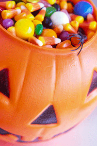 This candy-filled pumpkin looks festive, but ideally, it should not be from unknown sources. Never consume candy that has been taken out of its original packaging.