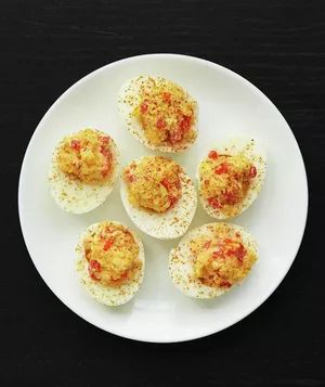 Spicy Deviled Eggs: These flavorful deviled eggs get a spicy kick, making them the perfect bite-sized treat for those who enjoy a little heat in their dishes.