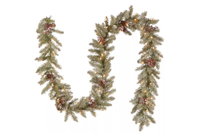 This 9-foot Dunhill Fir Garland comes pre-lit with clear lights, adding an elegant touch to any setting.