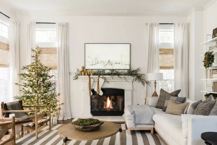 Elegant Holiday Mantel Display in a Minimalist Living Room Featuring a Christmas Tree