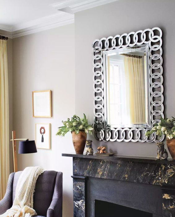 Feng Shui fireplace and mirror in a living room