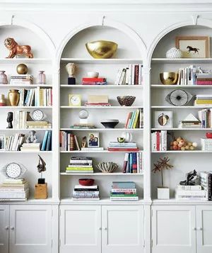 Feng Shui white book shelves in a home office