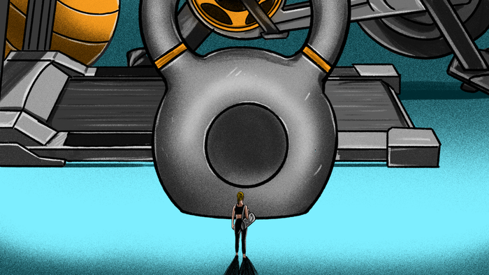 a small individual approaching large workout machines