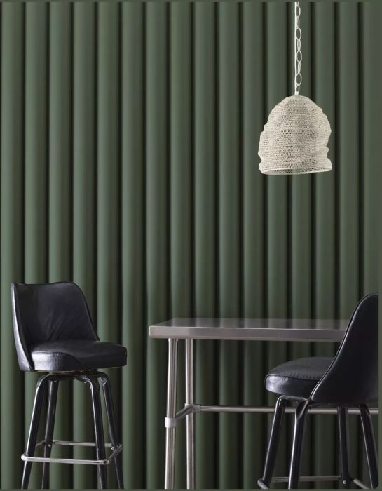 Chimichurri by Benjamin Moore offers a distinctive green hue that's perfect for bringing a touch of nature into your home decor.