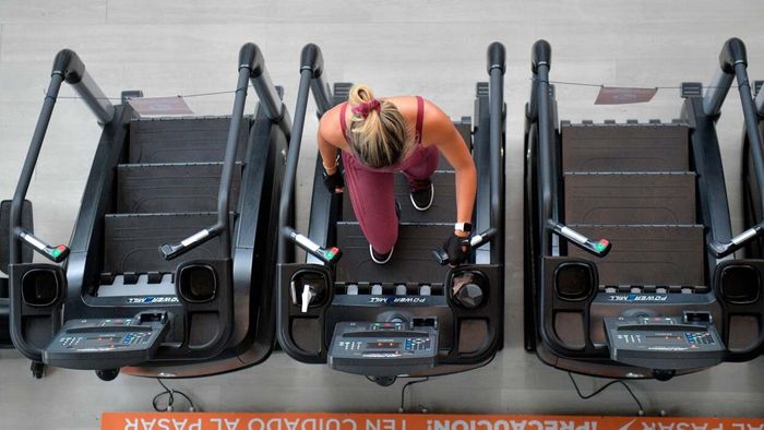 Individual on stairmaster machine