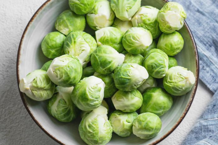 A bowl filled with fresh Brussels sprouts