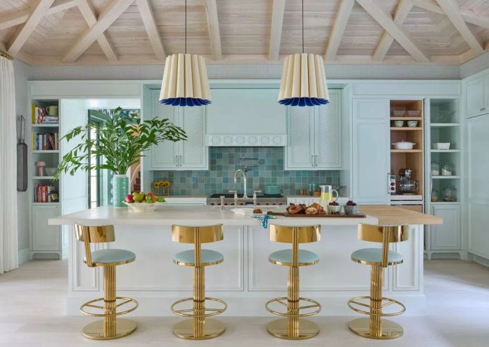 a kitchen featuring light blue tones