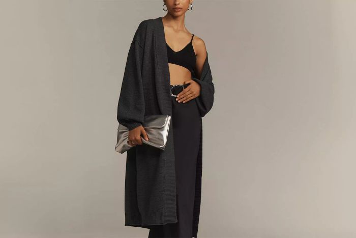 Anthropologie’s knit sweater offers a cozy, textured look perfect for adding warmth and style to your outfit.
