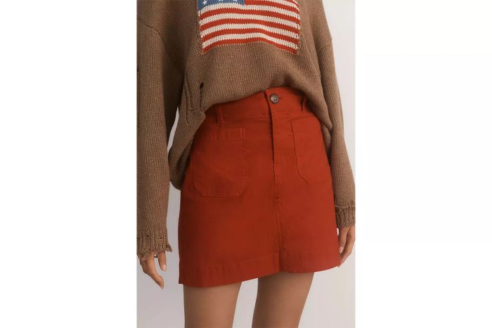 Anthropologie’s mini skirt combines trendy and timeless elements, making it a versatile addition to any wardrobe.