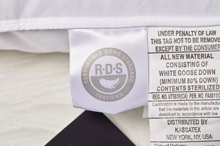 Closeup of the Kassatex European White Goose Down Pillow tag displaying its Responsible Down Standard (RDS) certification.