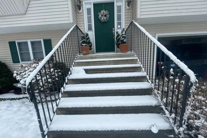 Steps filled with snow before using the Yeoman BustR Snow Shovel