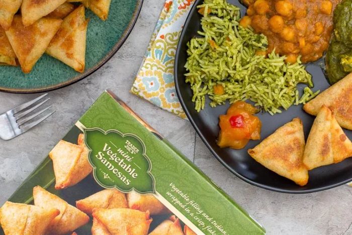 Trader Joe’s Mini Vegetable Samosas paired with rice and chickpeas make for a satisfying dish.