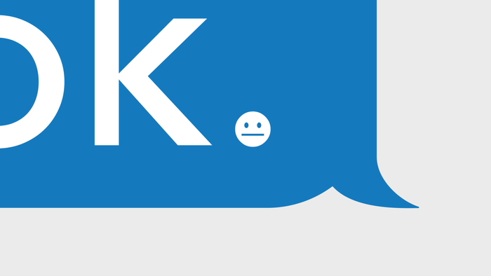 An exaggerated depiction of a text message featuring the word 'OK' and a sad face emoji replacing the period.