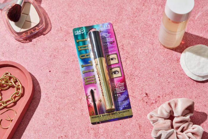 The Milani Highly Rated Lash Extensions Tubing Mascara in its packaging on a pink backdrop
