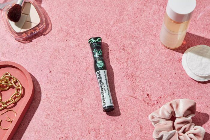 The Essence Cosmetics Lash Princess False Lash Effect Mascara in its packaging, set against a pink background