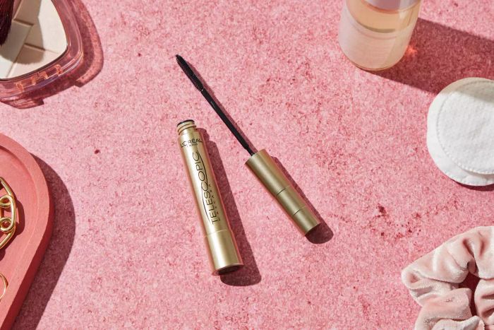The L'Oréal Telescopic Original Washable Mascara bottle displayed against a pink background