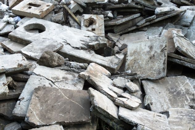 A pile of shattered concrete blocks. Construction wreckage.