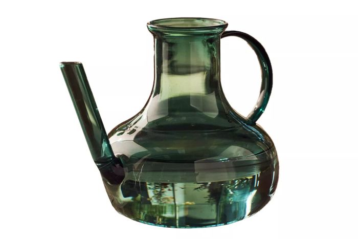 Terrain Addie Glass Watering Can offers a stylish and functional way to water your plants with its elegant design.