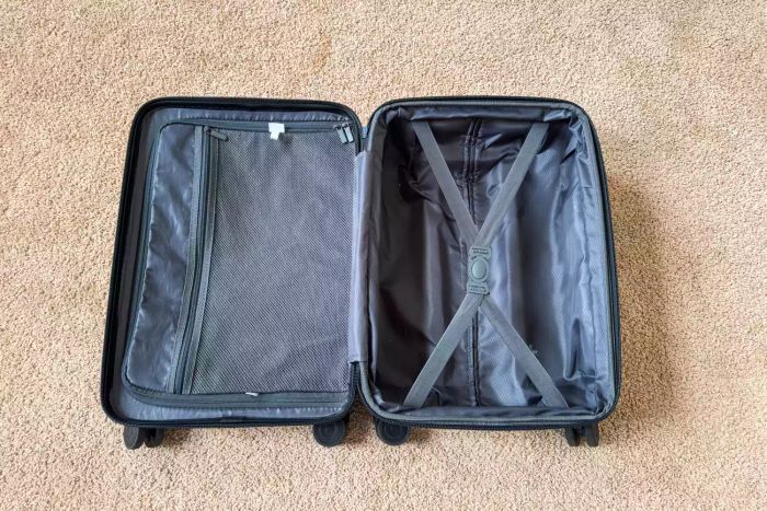 Discover the interior of the Open Story Hardside Carry-On Spinner Suitcase, packed with thoughtful details designed for convenience.