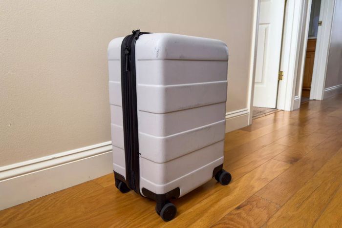 The Open Story Hardside Carry-On Spinner Suitcase