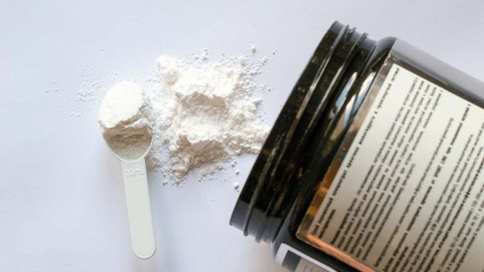 creatine powder, container, and scoop