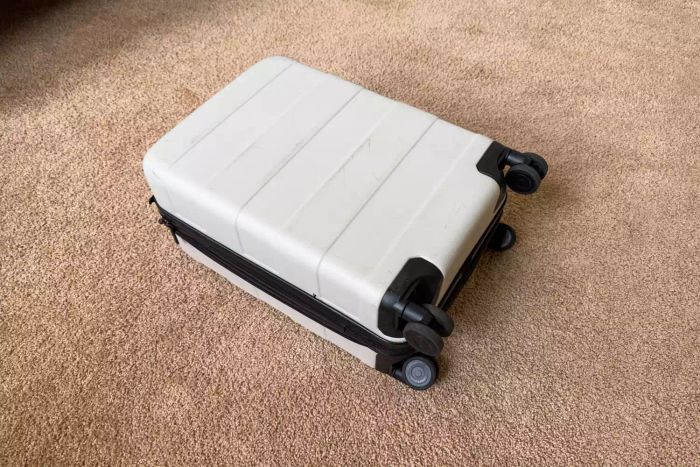 The Open Story Hardside Carry-On Spinner Suitcase